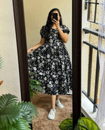 Load image into Gallery viewer, Black Muslin Dress With Price and Online Shopping price Under 1000 . Embrace tradition with this Muslin Dress featuring printed Work , breathable fabric, and feeding-friendly design. With a 3-meter flare and sizes from S to XXXL, it’s ideal for any occasion Celebration 2024-25 . 
