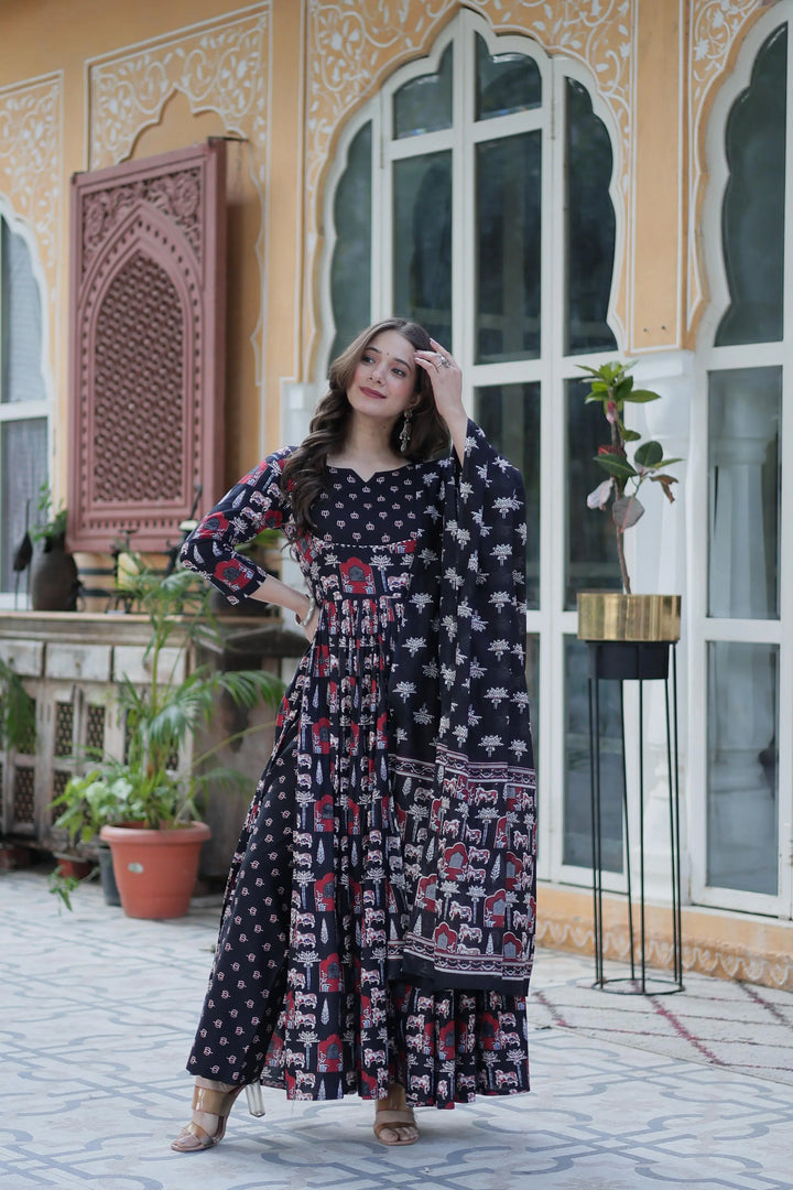 Digital Printed Black Pure cotton Anarkali set with 52-inch top (half-lined), fancy round neck, 40-inch bottom with adjustable 44 waist, and 2.20-meter cotton dupatta.
