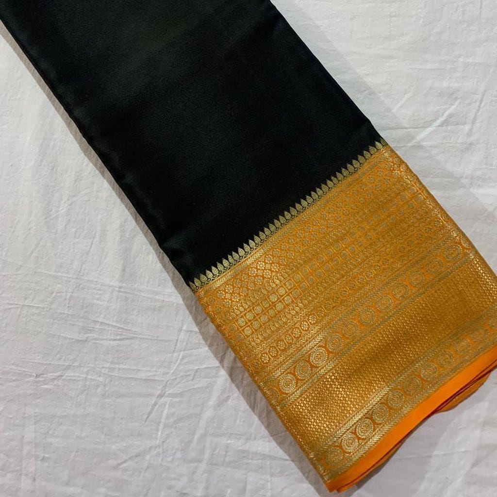 Black Semi-Mysore Silk Saree Online Price and Shopping In This Fabric Rich Fabric And Pallu Most Of Mainly Manufacturing Of MySore State In Karnataka , India . 