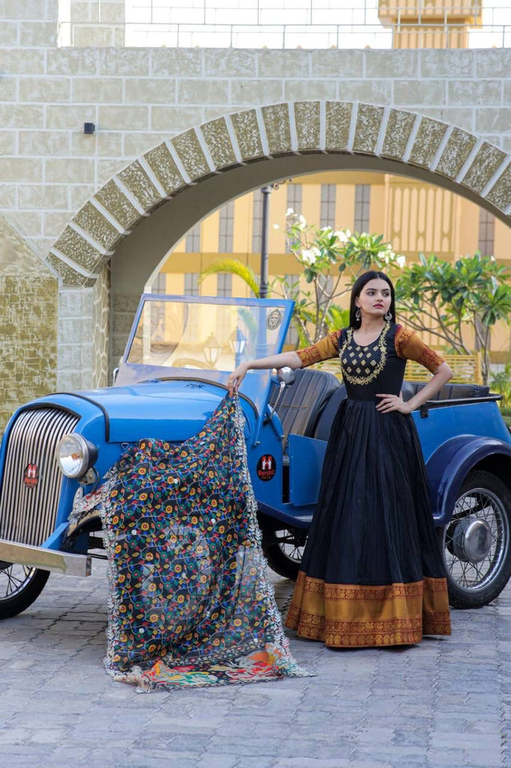 Black Color Silk Fabric With 
Jacquard Weaving Work and Embroidery Work Anarkali With Price and Online Shopping Price Under 2000 . This Fabric So Heavy Jacquard Weaving Work and Embroidery Work and Anarkali Bottom Side Heavy Border Zari Weaving Work , Dupatta Tebby Silk With Kalamkari Rich Print with Embroidered Cut Work , This Fabric Black Anarkali Wedding Wear Best Collection , Traditional Look For 2024-25 , 2025-26 . 