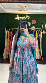 Load image into Gallery viewer, Blue printed Anarkali dress for casual to festive wear , Graceful blue Anarkali suit with puff half sleeves , Premium muslin Anarkali in royal blue color , Blue embroidery work Anarkali for special functions , 
V-neck blue Anarkali suit stitched to perfection . 
