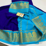 Load image into Gallery viewer, Royal blue Elegant Semi-Mysore Silk Saree featuring zari weaving. 6.3m length with matching blouse piece. Machine washable. Perfect blend of traditional craftsmanship and practical care.

