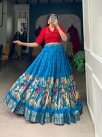 Load image into Gallery viewer, Blue Color Lehenga With Red Blouse Stitched Dhavani Set , Langa  Voni , Davani Set and Half-Saree Price and Online Shopping Price Under 2000 . this Fabric Blue Lehenga With Red Blouse For Wedding Best Wear Collection , This Lehenga Fabric Dola Silk , Work Kalamkari Print With Zari Weaving Broder Fair 3.50 Meter and Blouse Fabric Banglory and Work Plain With Lace Border , Traditional Look For 2025-26 . 

