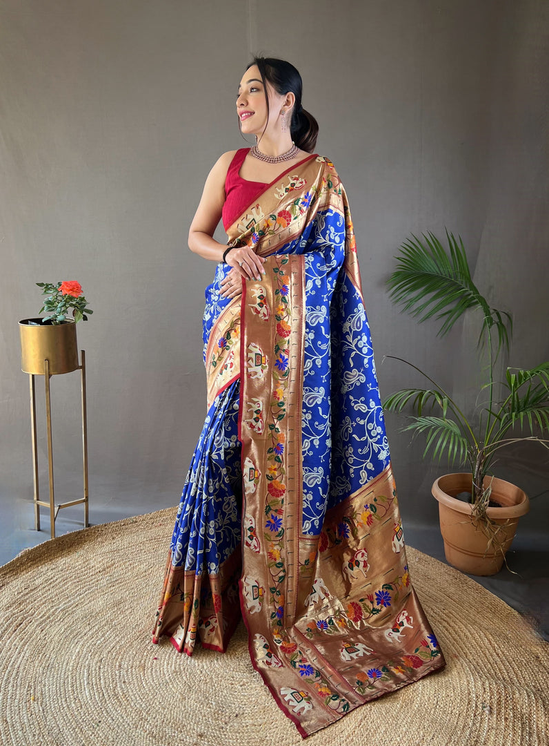 Blue Paithani Weaving Saree For Weddings Best Price and Online Shopping Price Under 2500 . this Saree Rich and Premium Border Zari Weaving Work Heavy Paithani Weaving Work and Red Blouse With Blue Saree Paithani Weaving . THis Traditional Woman Look For 2024-25 , 2025-26 . 
