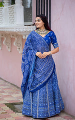 Load image into Gallery viewer, Blue Vaishali Silk Half-Saree , Dhavani Set , Langa Davani Set With Price and Online Shopping Price 3000 . Experience premium craftsmanship with this semi-stitched lehenga, featuring intricate Gota Patti and tassels work, a micro cotton inner, and a Maslin silk dupatta . this Fabric Blue Vaishali Silk Dhavani Set Best For Weddings Wear Collection and Traditional Look For 2024-25 , 2025-26 . 
