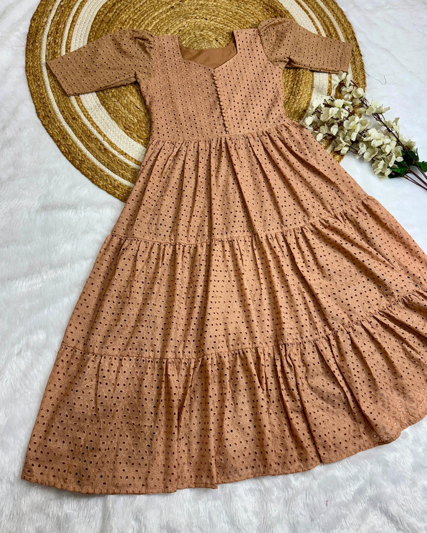 cream gown for modern ethnic occasions , Neutral cream short gown with handcrafted cotton finish , Minimalist cream layered gown for elegant looks , Cream Hakoba gown with full flair and stylish side pocket.