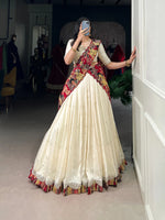 Load image into Gallery viewer, Cream lehenga with Kalamkari border , Elegant cream embroidered lehenga , Traditional cream color lehenga choli , Vichitra silk cream lehenga with dupatta , Cream lehenga for wedding function , Sequins embroidered cream  lehenga , Cream color lehenga with scallop dupatta , Cream festive wear lehenga set , Light cream lehenga for reception . 
