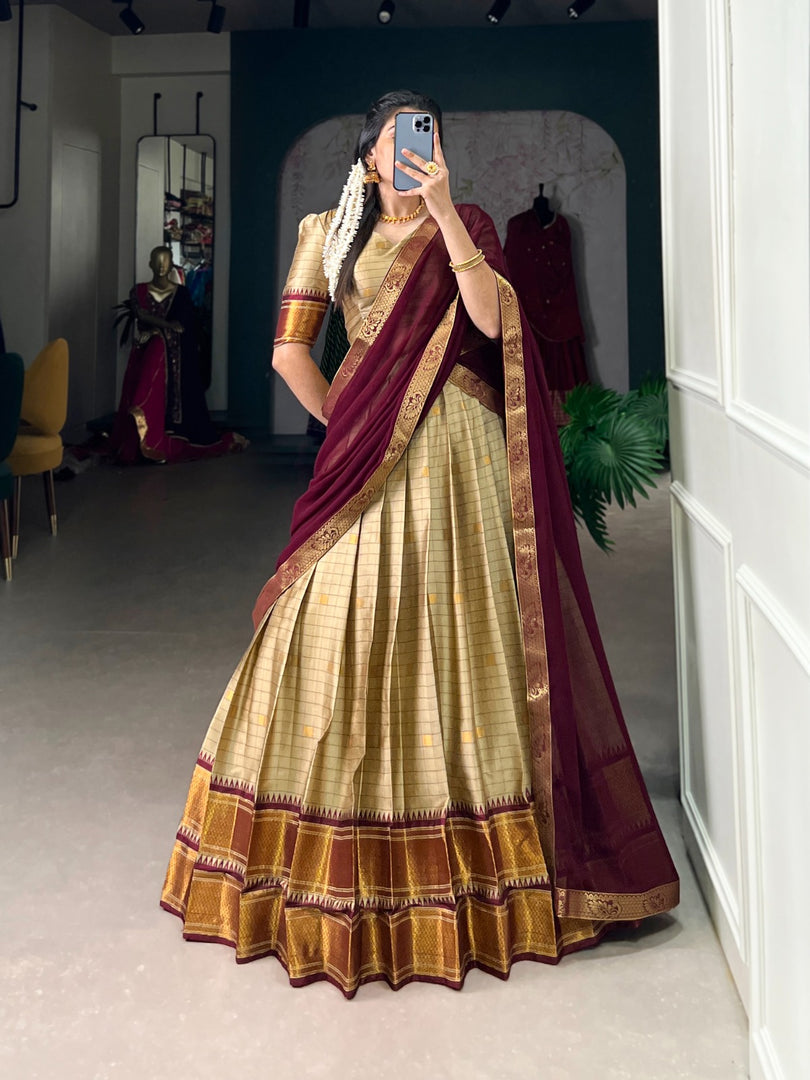 Premium Cotton Silk Half-Saree featuring Paithani weaving. Includes stitched lehenga , matching unstitched blouse, and Georgette dupatta with decorative lace border. Complete traditional ensemble with modern comfort.