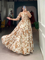 Load image into Gallery viewer, Cream Georgette Gown With Price and Online Shopping Price Under 1500 . Upgrade your wardrobe with this stylish Georgette Gown Kurti Set. Featuring soft fabric, printed work, and a 56-inch length,a complete elegant Tradition Look 2024-25 . 
