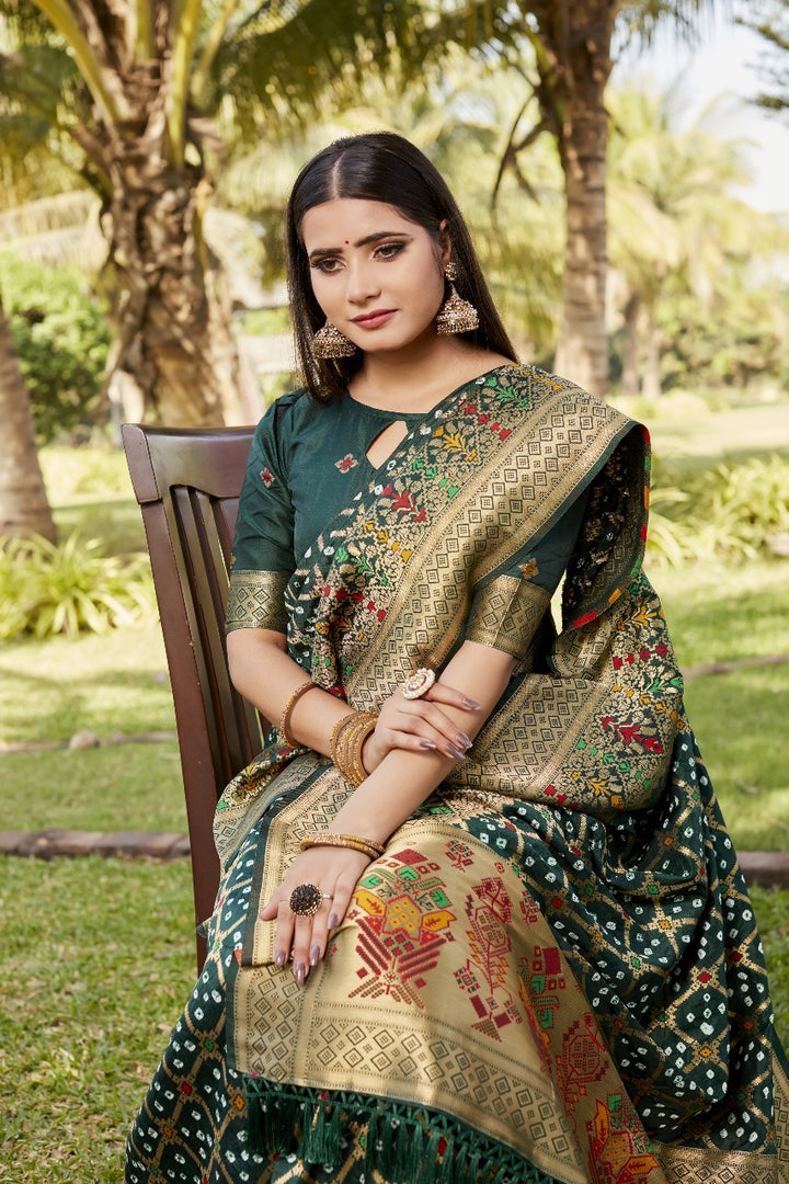 Dark Green Pure Gharchola Bandhej Silk Sarees With Price and Online Best Shopping Price Under 3000 . This Fabric Most Unique Design and Rajavadi Pattern For Rich Pallu . This Fabric Pure Gharchola Bandej Silk Sarees Gold Zari Weaving Work and Rich Fabric and Quality Best .