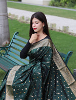 Load image into Gallery viewer, Dark Green Pure Soft Silk Saree with golden border and Zari Weaving Work in RIch Pattu Work in Zari . This Fabric Most Useful Product and India.
