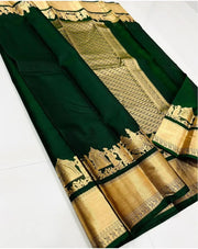Buy dark green lichi silk sarees with premium drape , Deep green silk saree with luxurious zari design , Soft lichi silk saree in festive dark green shade , Wedding wear dark green jacquard silk saree , Designer green saree with fine silk and woven border .