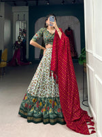 Load image into Gallery viewer, Dark Green Tussar Silk Dhavani Set , Langa Voni , Half-Saree and Langa Davani Set Price and Online Shopping Price Under 2000 , this Fabric So Heavy and Dark Green Color Rare Case Using Lehenga Floral Print With Foil Print Work , Blouse Printed and Foil Work and Dupatta Printed With Both Side Tassels , Traditional Look For 2024-25 , 2025-26 . 
