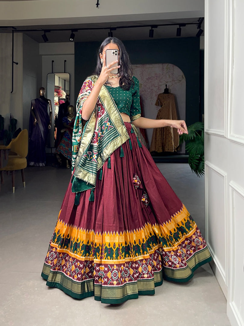 Dark Maroon Tussar Silk Dhavani Set , Langa Voni , Half-Saree and Davani Set With Price and Online Shopping Price Under 2000 . This Fabric Tussar Silk Traditional Look 2024-25 . This Fabric Soft and Patola Print With foil work . This Fabric Stitched For Stitched With Canvas and attached . This Fabric Tussar Silk Rajavadi Pattern and This famous For Patan in Gujrat  Famous. 