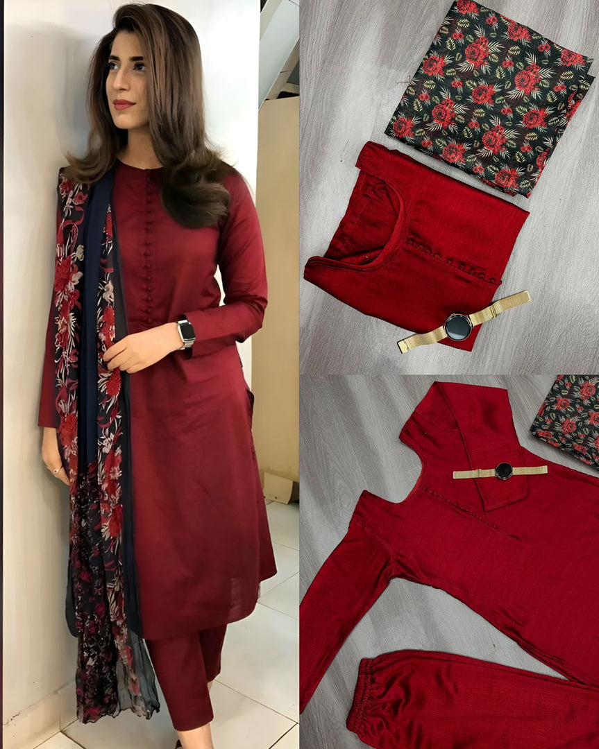 This red kurti is made from heavy blooming romain silk with printed design and comes with a printed Kota check dupatta. It features a boat neck, full sleeves, and a 46-inch length. The set includes one kurti and one dupatta . 