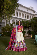 Load image into Gallery viewer, Dark Pink and Cream Dola Silk Dhavani Set , Langa Voni , Davani Set and Half-Sarees With Price and Online Best Online shopping Price Under 2000. Step into elegance with this Dola Silk Kalamkari Lehenga Set. Featuring a zari weaving border, printed design, and a matching dupatta with tassels, this ensemble is perfect for festive occasions . 
