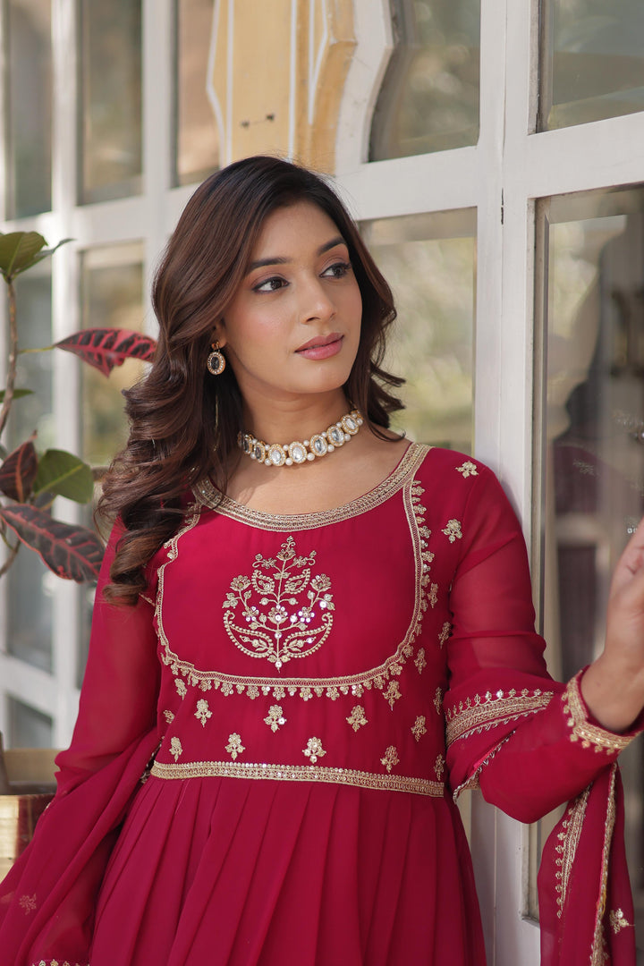 Dark Pink Color With Embroidery Faux Blooming Georgette Gown With Price and Online Shopping Price Under 2500 . Step into style with this Dark Pink Gown in Faux Blooming Georgette. Featuring heavy Rich Sequins Embroidered work, a stitched can-can design, and a Faux Blooming Georgette With Attractive lace and embroidered work, it’s ideal for weddings and celebrations . 