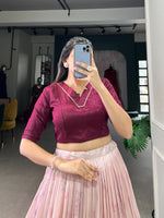 Load image into Gallery viewer, Expertly crafted Cotton Silk Dhavani featuring a floral print with zari border. Stitched lehenga includes 3.2-meter flair, 41&quot; length, and Complemented by a versatile Banglory blouse with lace border, adjustable from 36&quot; to 42&quot;. Complete traditional ensemble with premium finishing and drawstring closure with handmade tassels.
