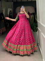 Load image into Gallery viewer, Dark Pink Jacquard Silk Gown With Price and Online Shopping Price Under 2000 . Step out in style with this elegant Jacquard Silk  Patola Silk Printed Gown. Featuring a flattering fit, cotton lining for comfort, and extra margin for size adjustments, it&#39;s perfect for festive or casual occasions . Traditional Look For 2024-25 .  

