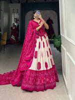 Load image into Gallery viewer, Dark Pink Tussar Silk Dhavani Set and Davani Set With Price and Online Shopping Price Under 2000 . Step into elegance with this Tussar Silk Bandhej Print
 Lehenga Set. Complete with lace details, tassels, and a stunning dupatta, this outfit is perfect for weddings and special celebrations Wear....
