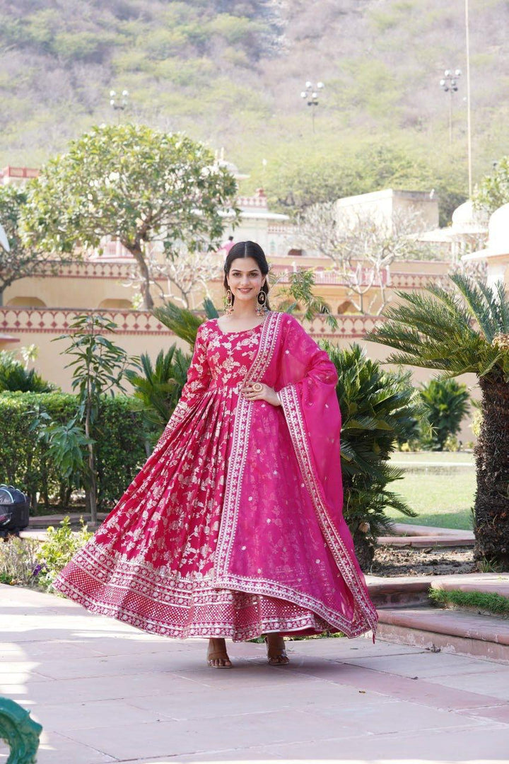 Dark Pink Viscose Dyable Jacquard Gowns With Price and Online Shopping Price Under 2500  . This Fabric Rich Border Premium Lace and Heavy Embroidery work This Fabric. This Fabric Heavy Fabric Viscose Diable Jacquard With Sequins Embroidered Work and Dupatta Russian Silk with Sequins Embroidered Work . Traditional look 2024-2025 . 