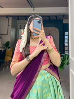 Load image into Gallery viewer, Shivali Jacquard Silk Pista Half Saree set features a stitched jacquard silk lehenga with zari weaving, supporting waist sizes up to 42 inches. It has a drawstring and zip closure, a 41-inch length, and a 4.5-meter flair, lined with micro cotton for comfort . 
