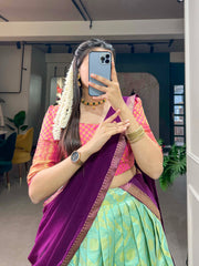 Shivali Jacquard Silk Pista Half Saree set features a stitched jacquard silk lehenga with zari weaving, supporting waist sizes up to 42 inches. It has a drawstring and zip closure, a 41-inch length, and a 4.5-meter flair, lined with micro cotton for comfort . 