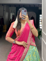 Load image into Gallery viewer, Complete Dhavani Set featuring stitched jacquard silk lehenga with zari work, matching stitched blouse with lace details, and georgette dupatta adorned with sequins, embroidery, and lace border.
