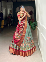 Load image into Gallery viewer, Dark Pista and Red Color Dola Silk Dhavani Set , Langa Voni , Davani Set and Half-Sarees With Price and Online Best Online shopping Price Under 2000 . Step into elegance with this Dola Silk Kalamkari Lehenga Set. Featuring a zari weaving border, printed design, and a matching dupatta with tassels, this ensemble is perfect for festive occasions . Traditional Look For 2024-25 , 2025-26 . 
