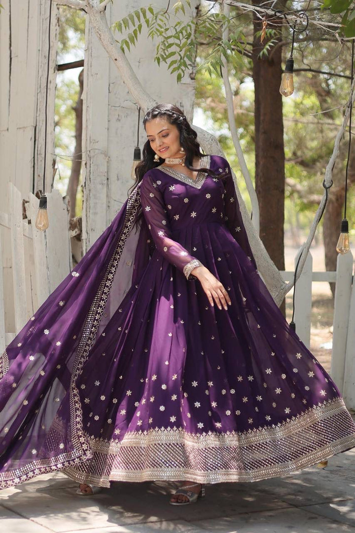Purple Sequin Embroidered Gown ,
Royal Purple Long Gown , 
Stylish Purple Gown with Dupatta ,
Purple Gown for Festive Occasions,
Elegant Purple Designer Gown .
