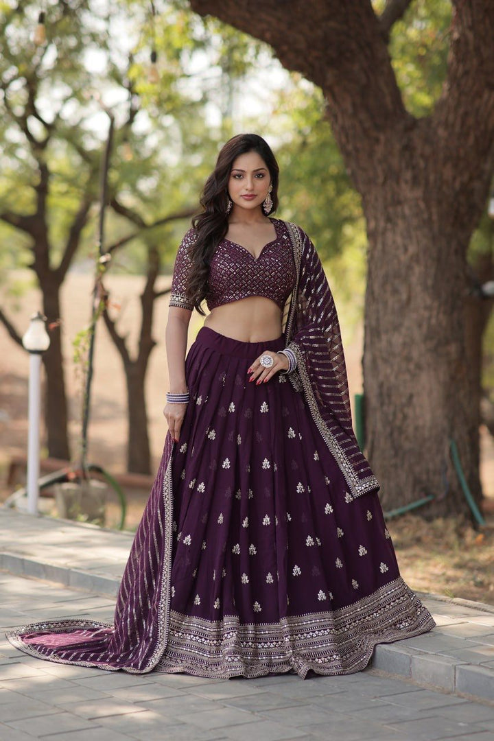 Dark Rani Faux Blooming With Heavy Sequins Dhavani Set , Langa  Voni , Davani Set and Half-Saree With Price 2000 . This Fabric Rich Border Silver Zari Weaving Work and Blouse Most Beautiful Crafted and Faux Blooming with Sequins dupatta with tassels, and an unstitched blouse, this ensemble exudes elegance for any festive occasion.