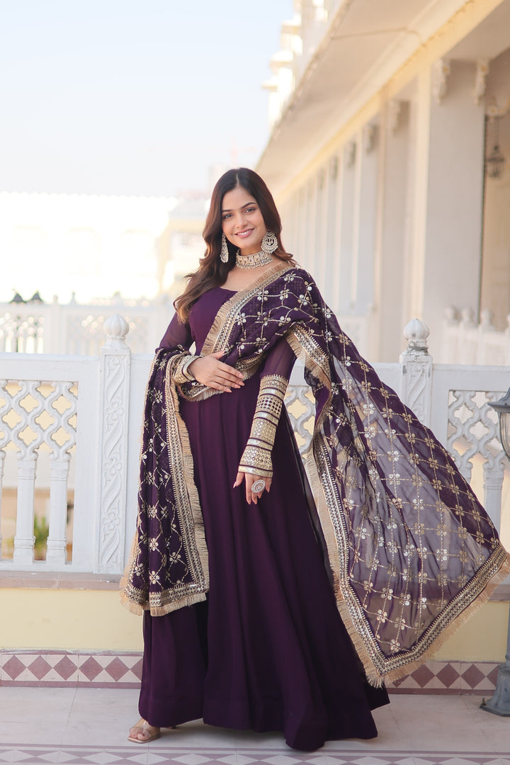 Dark Rani Faux Blooming Anarkali Embroidery Work with Round Neck Embroidered Gown with Designer Lace Sequins Embroidered work with designer lace border With Price and Online Best Shopping Price Under 2000 . Faux blooming gown with Sequins Embroidered Multi-Sequins work, full sleeves, and a 2.30 meter dupatta. Available in rich Dark Rani . Perfect for festive occasions . 