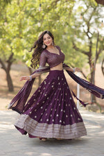 Load image into Gallery viewer, Shop a stunning Dark Purple lehenga set with designer lace dupatta and handcrafted latkans , 
Get a modern ethnic look in this Dark Purple party wear lehenga with 3.5-meter flair , Discover the beauty of traditional design in our Dark Purple embroidered lehenga for women . 
