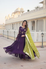 Load image into Gallery viewer, Dark Rani Faux Georgette Anarkali With Price And Online Shopping Price Under 2000 . This Fabric So Heavy and Shop this elegant 56-inch gown in faux georgette with multi-sequins embroidery, a 12-meter flair, and a 3-layer frill design. Includes a 2.3-meter sequins lace dupatta in Parrot. Traditional Look For 2024-25  2025-26 . 
