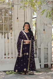 Dark Rani Or Purple Color Vichitra Shimmer Anarkali With Price and Online Shopping Price Under 2000 . This Fabric Vichitra Shimmer Gown with Sequins Embroidery & Arco-Cut Dupatta Work and Elegant 56-inch gown crafted from Vichitra shimmer fabric with sequins embroidery, 3.5-meter flair, and a fancy V-neck. Includes a 2.3-meter sequins arco-cut dupatta. Available in beige and purple.  
