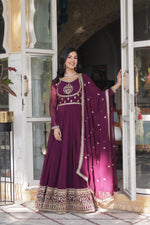 Load image into Gallery viewer, Soft &amp; Flowing Faux Blooming Georgette Fabric , Comes with a Matching Dupatta for a Complete Look , Buy Designer Embroidered Gown Online , Latest Full Sleeve Gown for Festive Wear and Stylish Faux Georgette Gown with Lace Work . 
