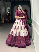 Load image into Gallery viewer, Wine Tussar silk lehenga with handcrafted drawstring closure , Elegant wine color ethnic lehenga for bridal and party wear , Premium wine lehenga with can-can and micro cotton lining , Bandhej printed wine lehenga with zari lace and tassel dupatta . 
