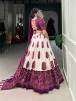 Load image into Gallery viewer, Wine color Bandhej print lehenga in elegant tussar silk , Traditional wine silk lehenga with gotta patti lace dupatta , Wedding wear wine lehenga with tassels and foil highlights . 
