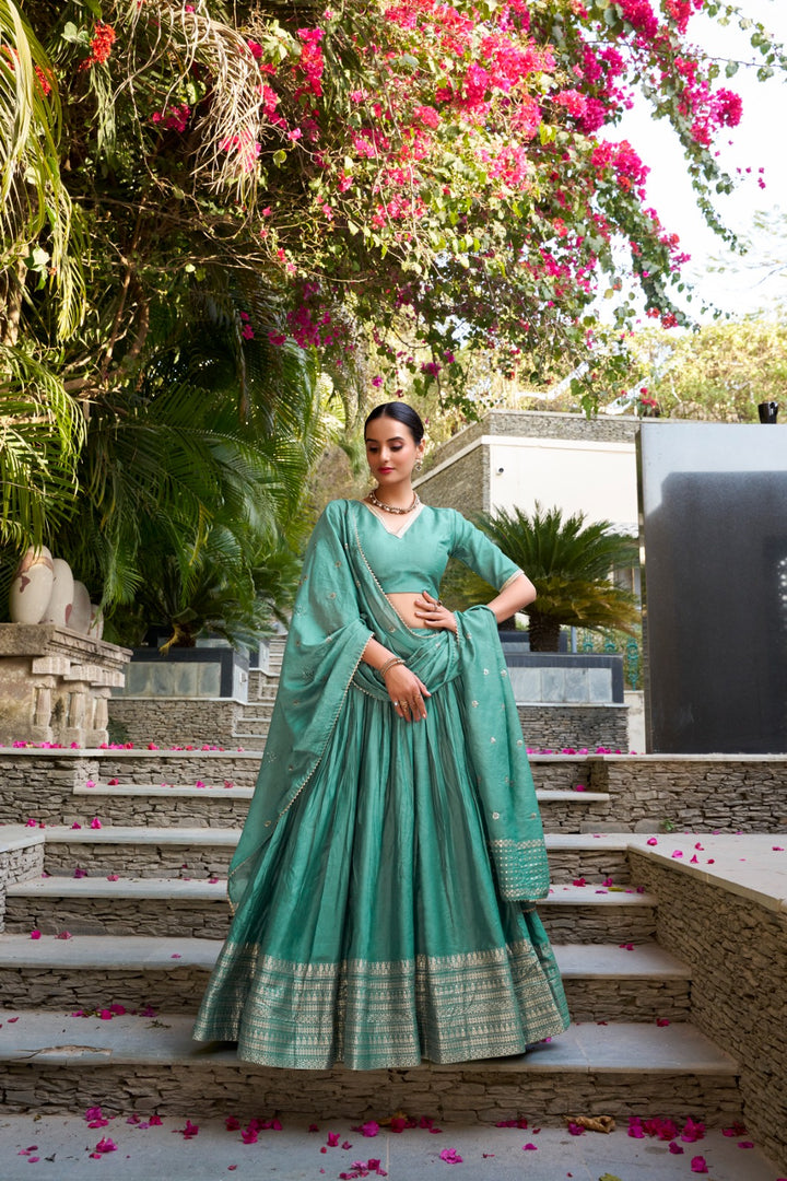 Light Blue Chanderi Lehenga with Zari Border , Elegant Light Blue Lehenga for Daytime Functions , Pastel Blue Traditional Lehenga for Wedding Events , Light Blue Embroidered Lehenga Set with Dupatta , Soft Blue Chanderi Lehenga for Festive Wear.