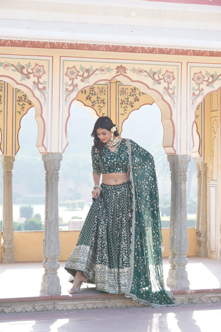 Dark Sky lehenga set with faux blooming blouse fabric , Modern festive look in Dark Sky lehenga with sequin detailing , Stunning Dark Sky lehenga with tassels and zip closure , Sophisticated Dark Sky lehenga for parties and receptions , Designer Dark Sky color lehenga with 3.5 Meter flair . 