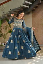 Load image into Gallery viewer, Rama color designer lehenga with cancan and tassel tie-up , Rama green silk saree for traditional family functions , Fancy Rama color gown with multi-thread and sequins work , Shop premium Rama color outfits online at best price . 
