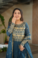 Load image into Gallery viewer, Sequin Rama  Chinon Anarkali gown with cotton lining and matching embroidered dupatta. Premium wedding attire with elegant detailing.
