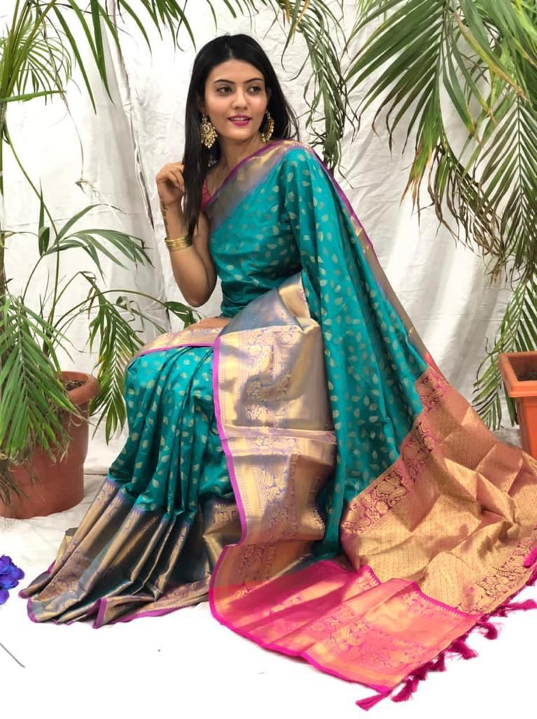 This Saree Beautiful  Dark Sky Soft Kanjivaram Silk Sarees With Price and Online Shopping Price under 1500 . This Saree Gold Zari Weaving Work and Pink Shadows this Saree and RIch Pallu Tradition look For 2024-25 .  