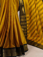 Load image into Gallery viewer, Yellow zari weaving saree for haldi and functions , Bright yellow aura silk saree with classic border , Festive wear yellow silk saree with zari detailing , Yellow saree with matching blouse piece included , 
Aura silk yellow saree for radiant ethnic charm .
