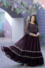 Load image into Gallery viewer, Purple or Wine Faux Blooming Gown With Price and Online Shopping Price Under 1500 . this Experience elegance with this Faux Blooming Gown. Complete with exquisite embroidery, short cutwork sleeves, and full cotton lining, it’s a timeless piece for festive or formal occasions . Traditional Look 2024-25 . 
