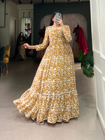 Load image into Gallery viewer, Gold Georgette Gown With Price and Online Shopping Price Under 1000 . this stunning Georgette Printed Gown. Designed with a 4.5-meter flair, full-length cotton lining, and adjustable sizing, it&#39;s ideal for celebrations and Any Festival . 
