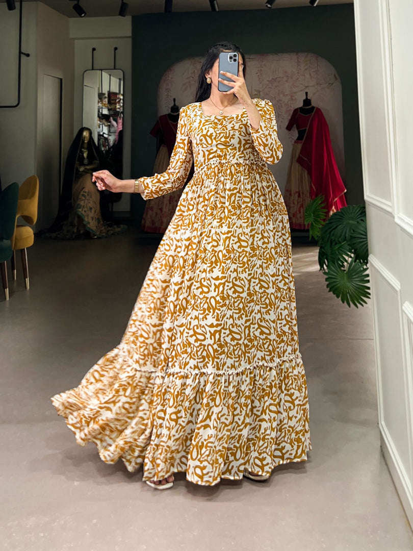 Gold Georgette Gown With Price and Online Shopping Price Under 1000 . this stunning Georgette Printed Gown. Designed with a 4.5-meter flair, full-length cotton lining, and adjustable sizing, it's ideal for celebrations and Any Festival . 