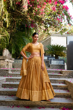 Load image into Gallery viewer, Golden Chanderi Lehenga for Wedding Ceremonies , Shiny Gold Zari Work Lehenga Set , Party Wear Gold Lehenga with Embroidery , Golden Traditional Lehenga with Dupatta , Festive Gold Lehenga for Sangeet Night . 
