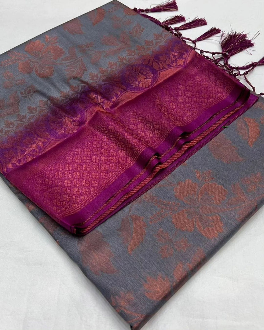 Elegant Soft Silk Saree featuring Zari Weaving. 6.3m length with matching blouse piece. Machine washable. Model wears Best Quality Saree .