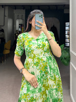 Load image into Gallery viewer, Green Color Rayon Frock or Dresses With Price and Online Shopping Price Under 1000 . Discover this ready-to-wear Rayon frock featuring a beautiful Printed With Foil Work , adjustable chest fit, and 3.50-meter flair with micro cotton lining.
